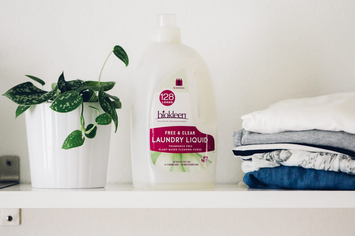 Biokleen laundry soap in a bottle on the laundry shelf. 